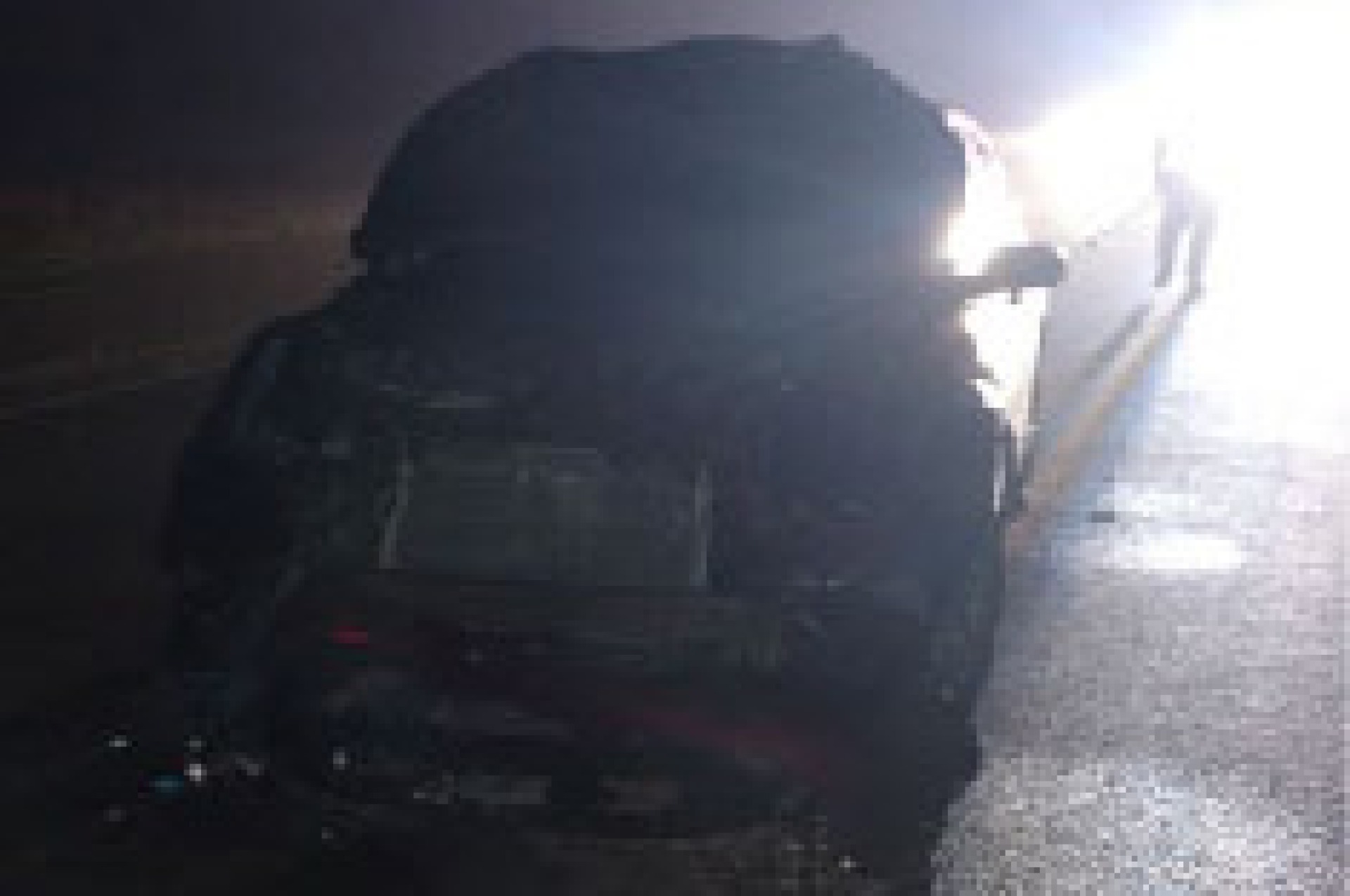 car hits a deer on highway 1-35
